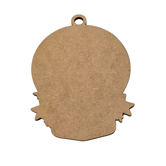 Cardboard pumpkin cutout on a white background