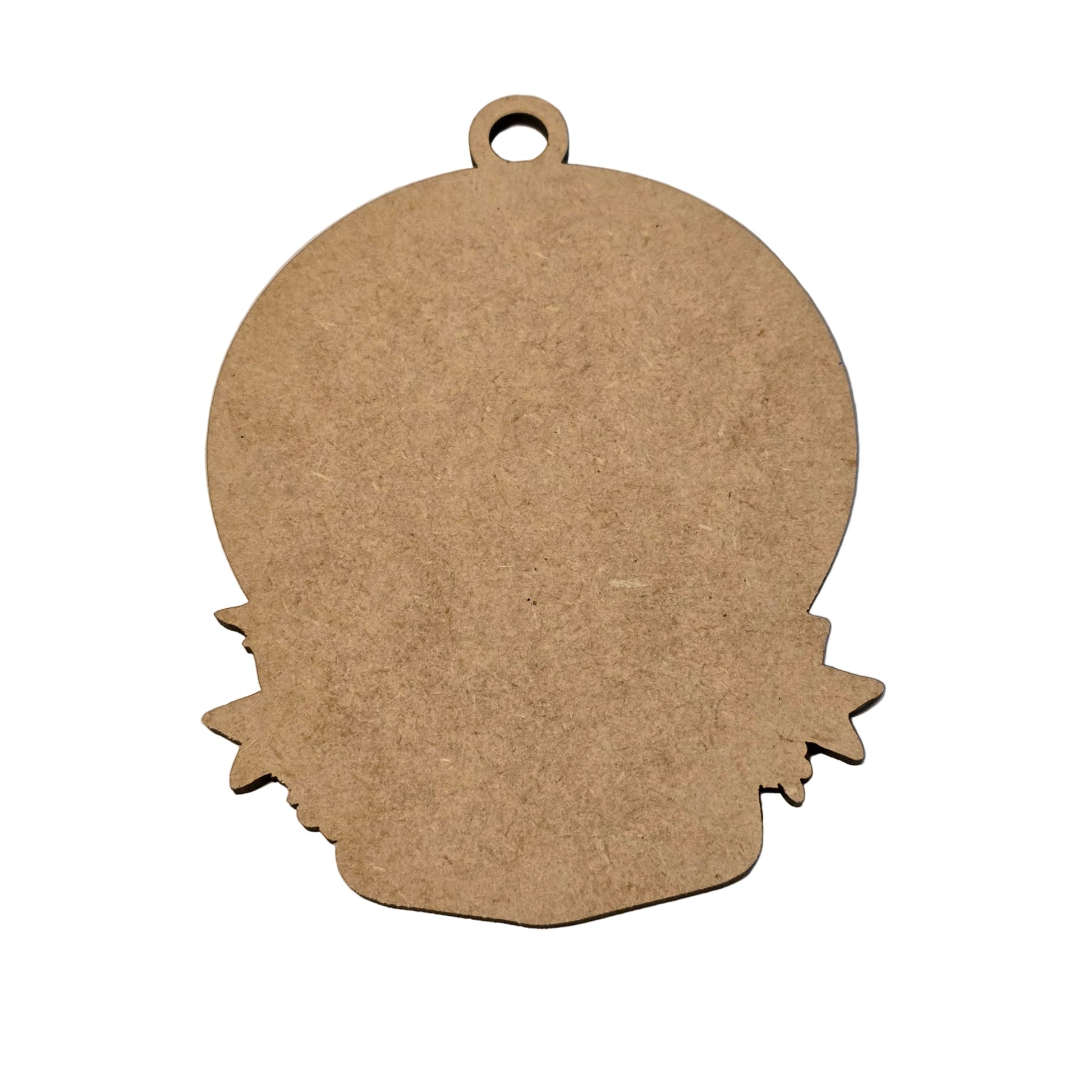 Cardboard pumpkin cutout on a white background