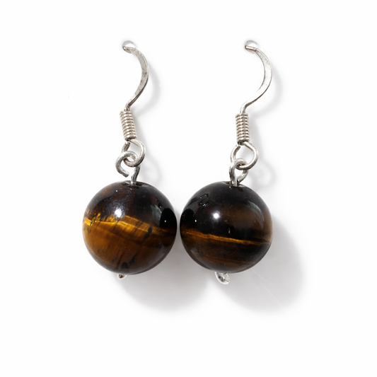 Pair of tiger eye stone earrings on a white background