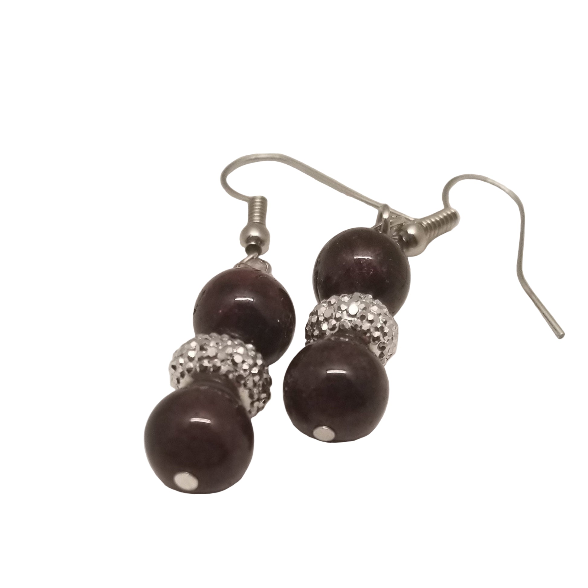 Pair of earrings with brown beads and silver accents on a white background